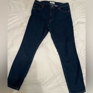 Abercrombie and Fitch Women's Super Skinny High Rise Jeans in dark wash.
